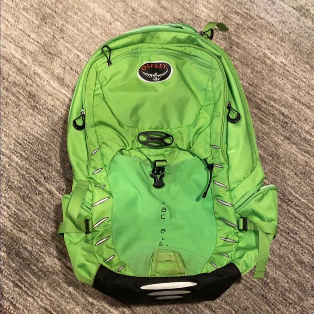 An Osprey bright green backpack